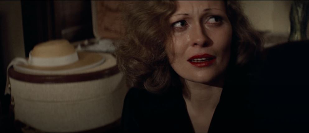 Faye Dunaway as "the terrible secret" comes out