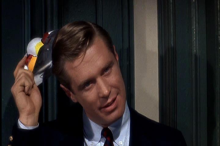 George Peppard removing his halloween mask in Breakfast at Tiffany's